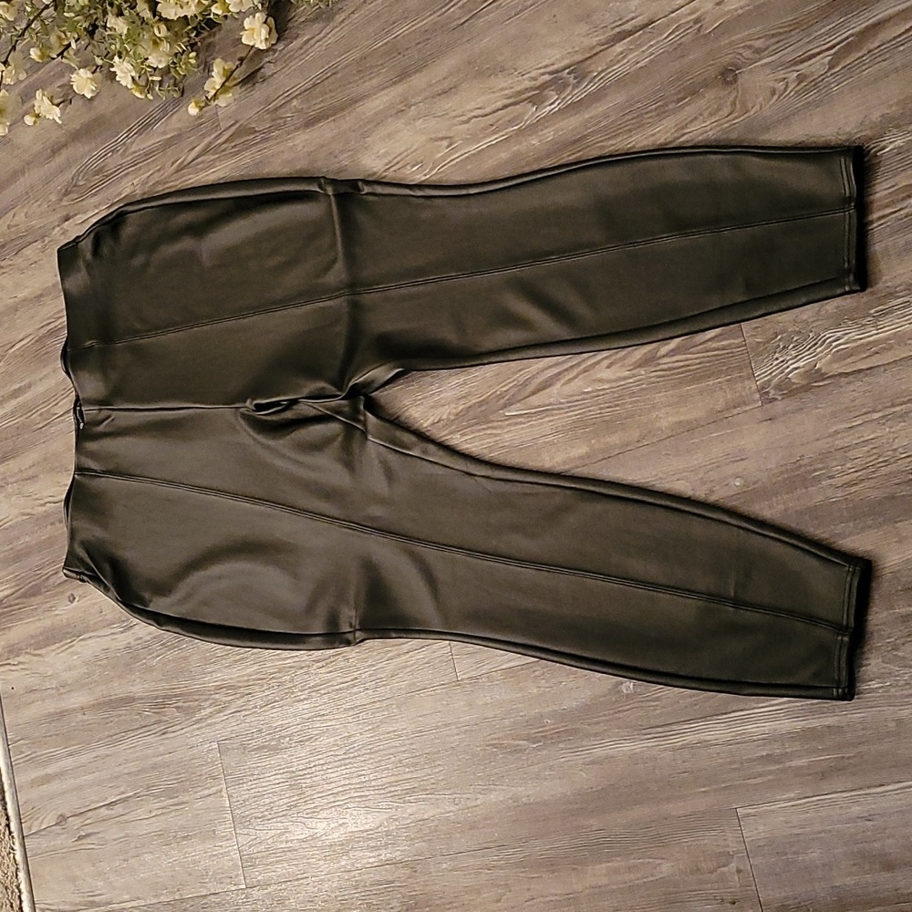 NWOT, Black faux leather like pull on pants/ leggings in a sz. 2 (18-20).